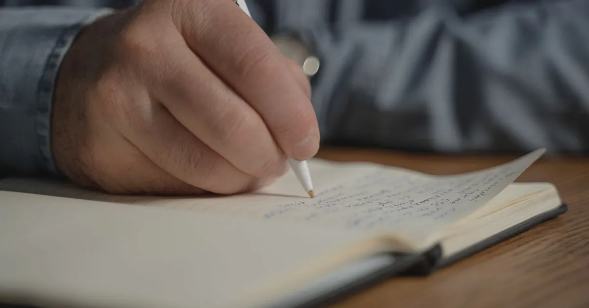 Open notebook and pen on a wooden desk, ready for quick handwritten notes