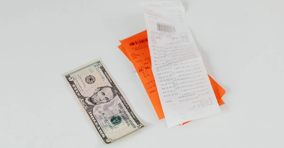 Restaurant bill and receipt on a table, ready for tip calculation