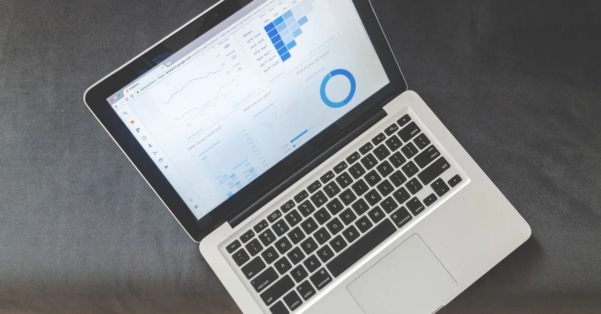 Laptop screen showing marketing analytics charts used to track UTM campaign traffic
